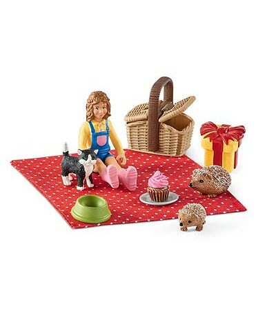Dievčatko a zvieratká na pikniku