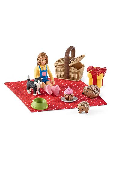 Dievčatko a zvieratká na pikniku