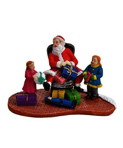 Święty Mikołaj z dziećmi i prezentami